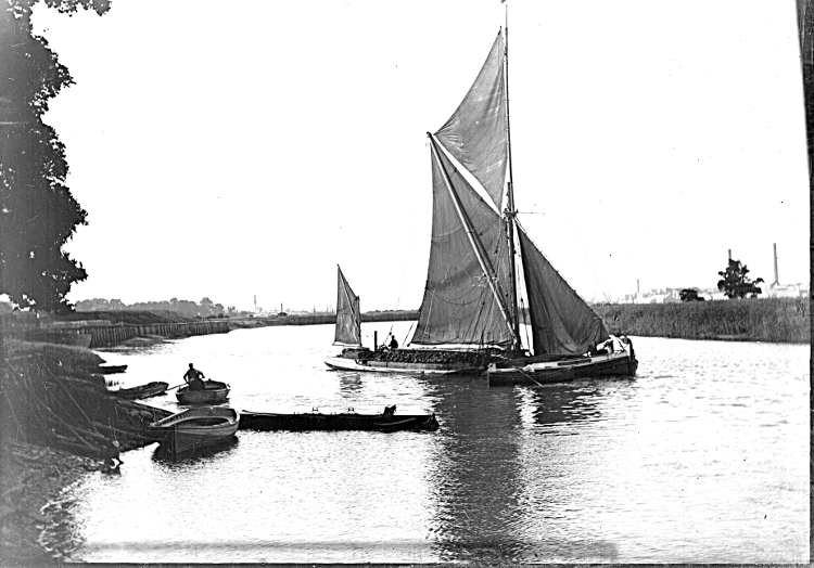 The barge
                carrying coal enters the bend in the river